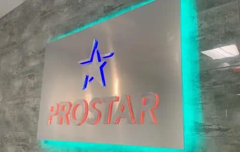 Interior LED backlit ProStar sign on a brushed metal panel