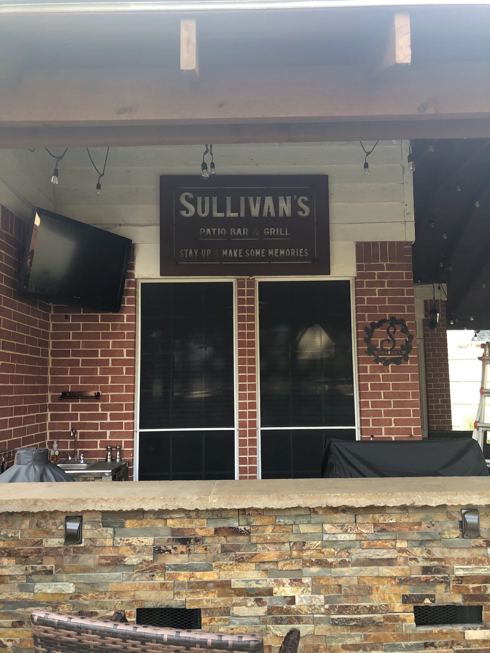 Sullivan's custom metal sign installed on the restaurant exterior