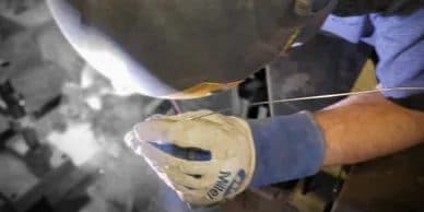 TIG welding a stainless steel part up close